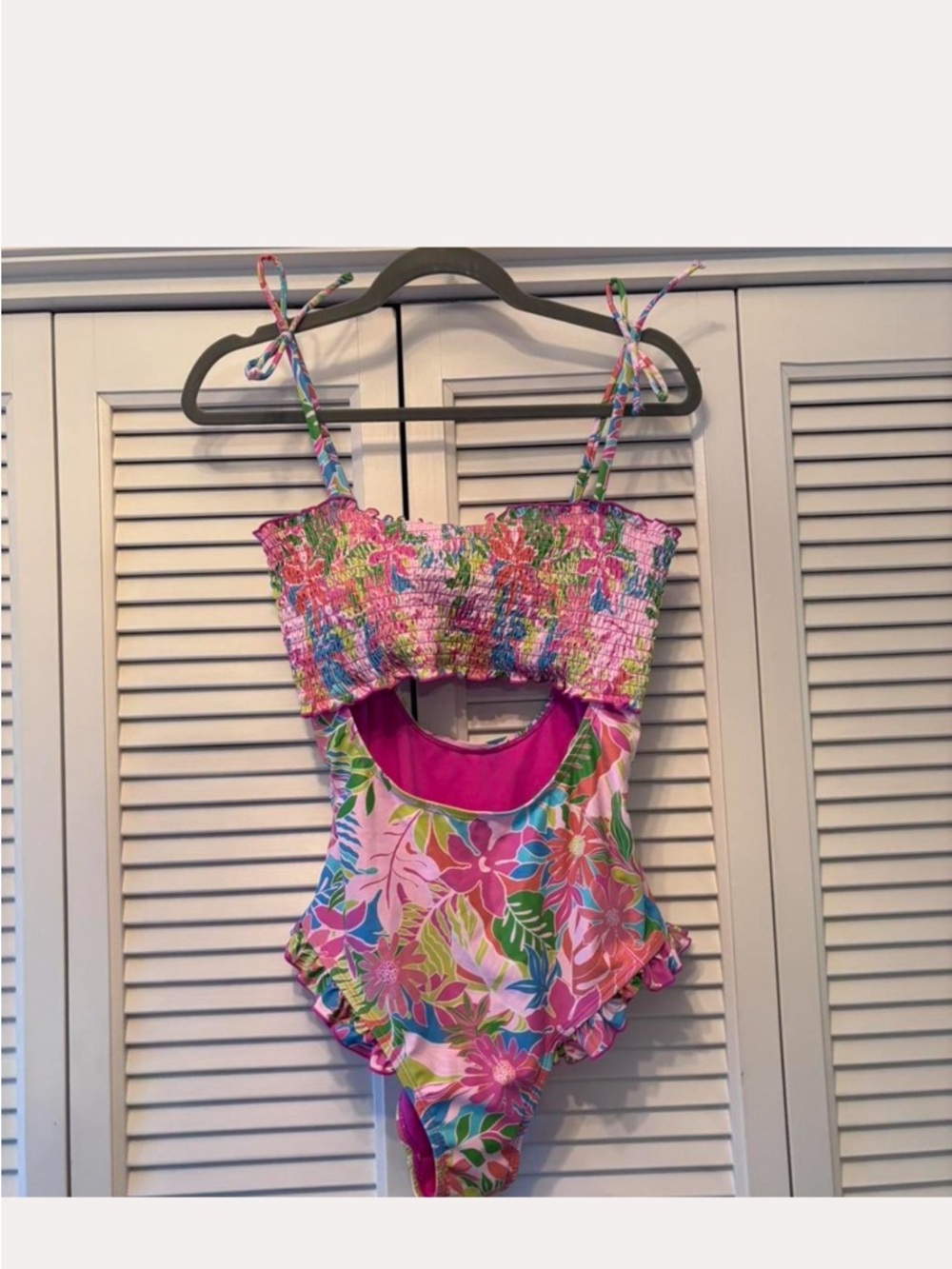 NWT women’s medium Pink Floral One-Piece Swimsuit with Smocked Top
